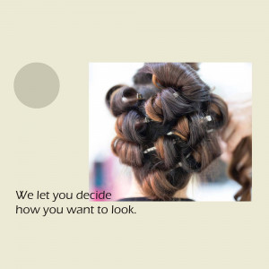 Close-up of a woman's intricate updo hairstyle with hairpins