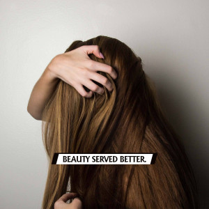 Woman with long brown hair covering her face, with text 'Beauty Served Better'