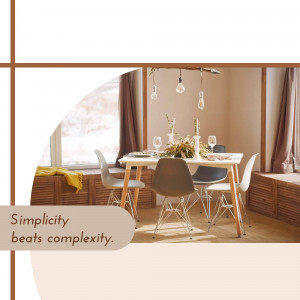 A warmly lit dining room with a minimalist aesthetic and a window seat.