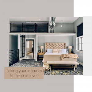 A stylish loft bedroom with a large bed and open design.