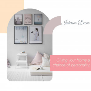 A stylish living room interior with wall art and soft furnishings.