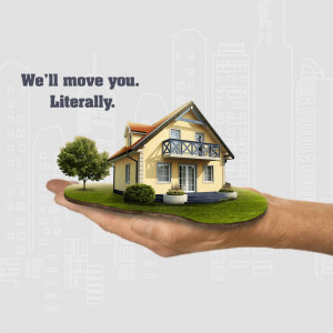 A hand holding a miniature house, representing a moving or real estate service.