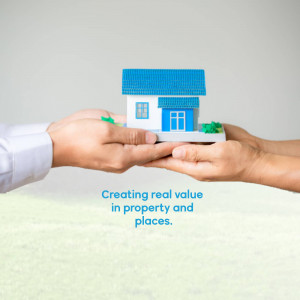 Two hands holding a small blue and white house model, symbolizing real estate and property value.