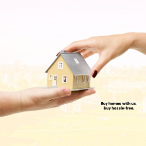 A miniature house being held in two hands, symbolizing a real estate transaction.