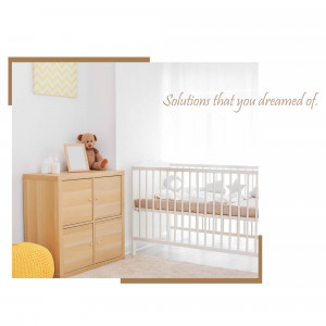 A bright and airy baby room with a crib, dresser, and teddy bear.