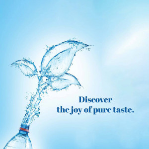 Water splashing from a bottle forming a leaf shape