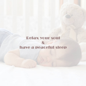 A baby sleeping peacefully with a teddy bear.