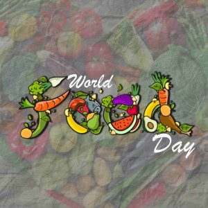 Colorful illustration of fruits and vegetables with the text 'World Food Day'