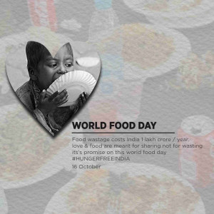 A child holding a plate in the shape of a heart with text about food wastage.