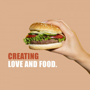 A hand holding a juicy burger against a peach background with text 'Creating Love and Food'.