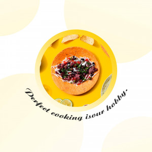 Overhead shot of a vibrant taco salad in a fried tortilla bowl, garnished with lime and served with tortilla chips.