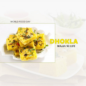 A plate of delicious Dhokla with the text 'World Food Day' and 'Dhokla Majja Ni Life'