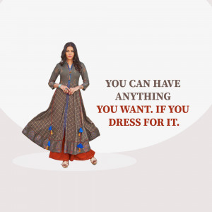 A woman wearing a beautiful grey and red Indian dress with a motivational quote.