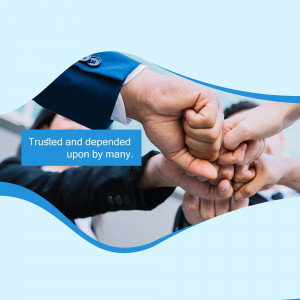 Diverse group of people with hands stacked in a fist bump, symbolizing teamwork and trust.