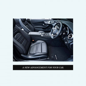 Interior view of a black Mercedes-Benz car with leather seats and a modern dashboard.