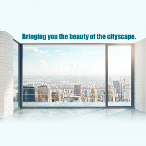 View of a city skyline through large apartment windows