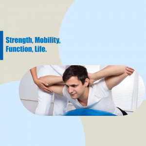 Man undergoing physical therapy with a therapist assisting in a stretch.