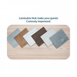 Assortment of laminate flooring samples in various colors and textures