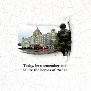 Image depicting the Taj Mahal Palace Hotel during the 26/11 Mumbai attacks, with a soldier in the foreground and emergency vehicles present.