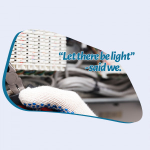 Electrician working with wires and tools, with a quote about light.