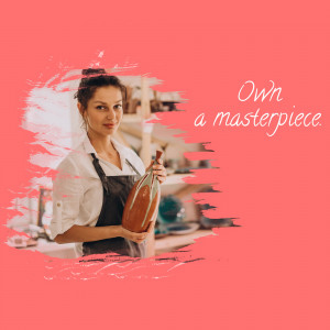 Woman holding a pottery vase in a workshop