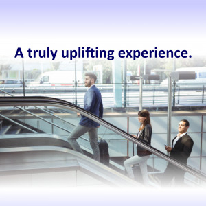 People traveling in an airport on an escalator