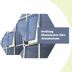 Modern building facade with aluminum panels and text 'Nothing illuminates like Aluminium.'