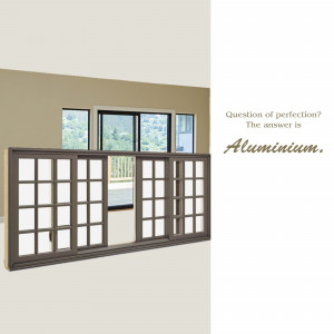 Brown aluminum sliding glass doors in a beige room