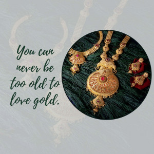 Close-up of gold necklaces and earrings with a motivational quote.