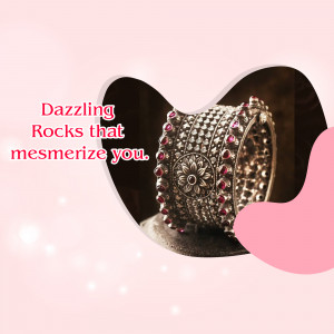 Close-up of a silver bracelet adorned with ruby gemstones