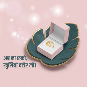 Gold earrings presented in a pink gift box on a dark teal leaf