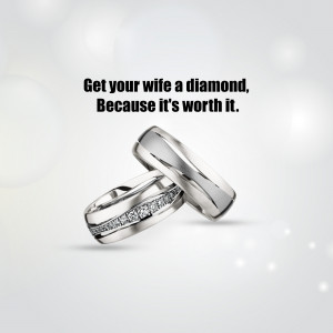 Close-up of two silver wedding rings with a diamond accent, with text promoting diamond gifts.
