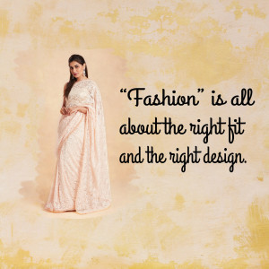 Woman wearing a light pink embroidered saree with a quote about fashion.
