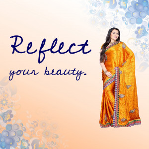 Woman wearing a vibrant orange saree with floral design, promoting beauty and fashion.