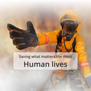 Firefighter reaching out during a rescue operation