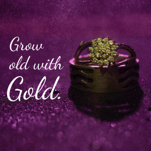 Close-up of gold wedding rings with the text 'Grow old with Gold.'