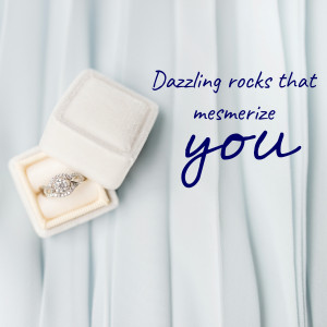 Close-up of a diamond engagement ring in an open white box
