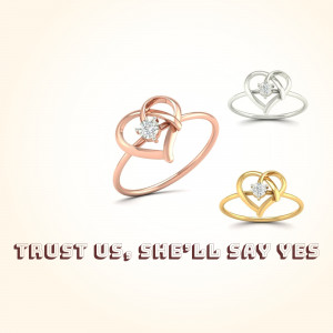 Three diamond heart rings in rose gold, white gold, and yellow gold