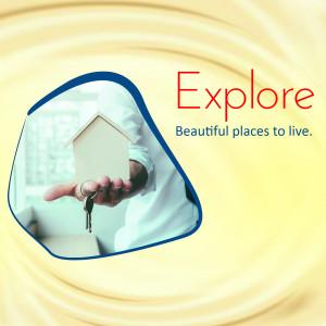 Hand holding keys in front of a house silhouette