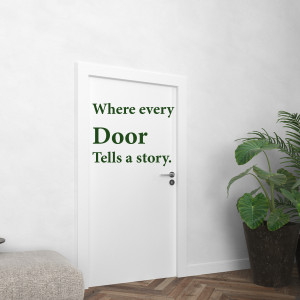 White door with green text reading 'Where every Door Tells a story.'