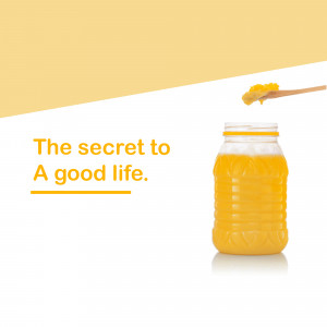 A glass jar filled with golden honey with a spoonful being drizzled out, accompanied by text 'The secret to A good life.'