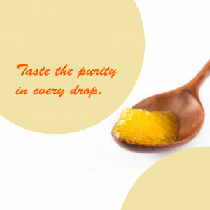 Close-up of honey on a wooden spoon with a yellow background