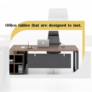 A modern executive office desk with a chair, laptop, and accessories.