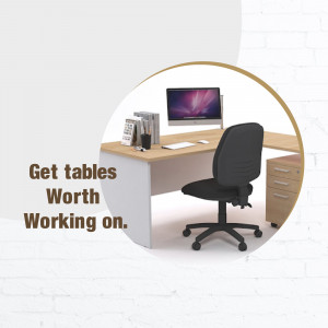 Image of a modern office desk with a computer, chair, and accessories.