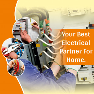 Electrician working on electrical panel with tools