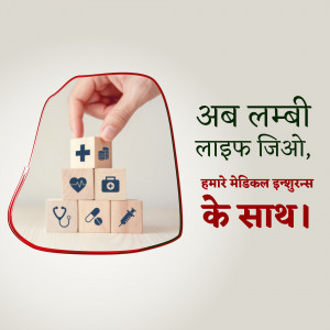 Hand placing a block with a plus sign on a stack of blocks representing medical icons.