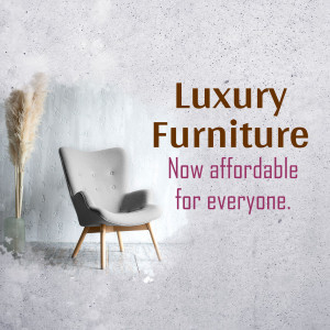 Gray armchair with wooden legs and pampas grass decoration