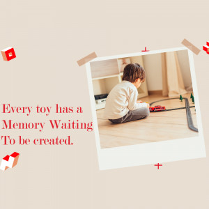 A young boy playing with toy cars on a wooden floor.