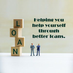 Wooden blocks spelling 'LOAN' with miniature figures representing financial assistance.