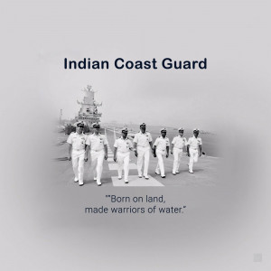 Group of Indian Coast Guard officers in uniform walking towards the camera.